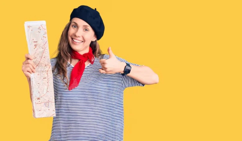 A girl wearing a French beret giving a thumbs up, representing the opportunities in the French e-liquid market